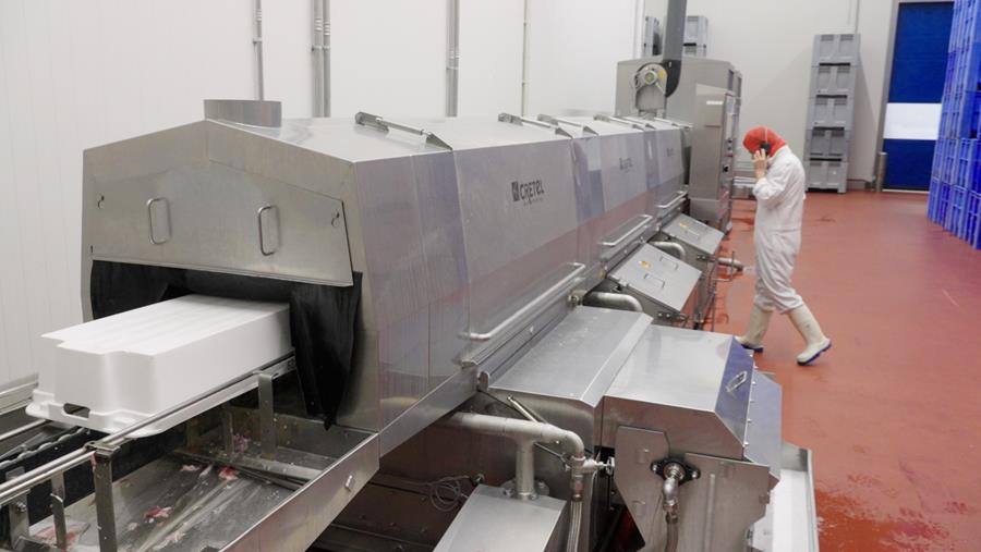 Lavage et séchage automatisés de caisses de viande